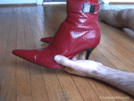 Red boots hand trampling